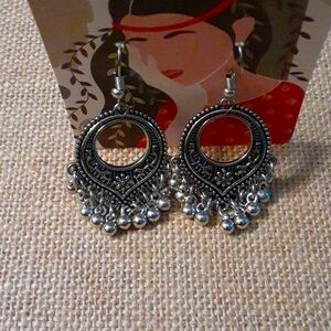 Earrings. Silver floral design, hanging chandlier ball beads.